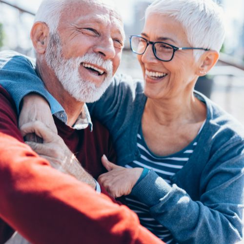 elderly couple happy post stroke treatment