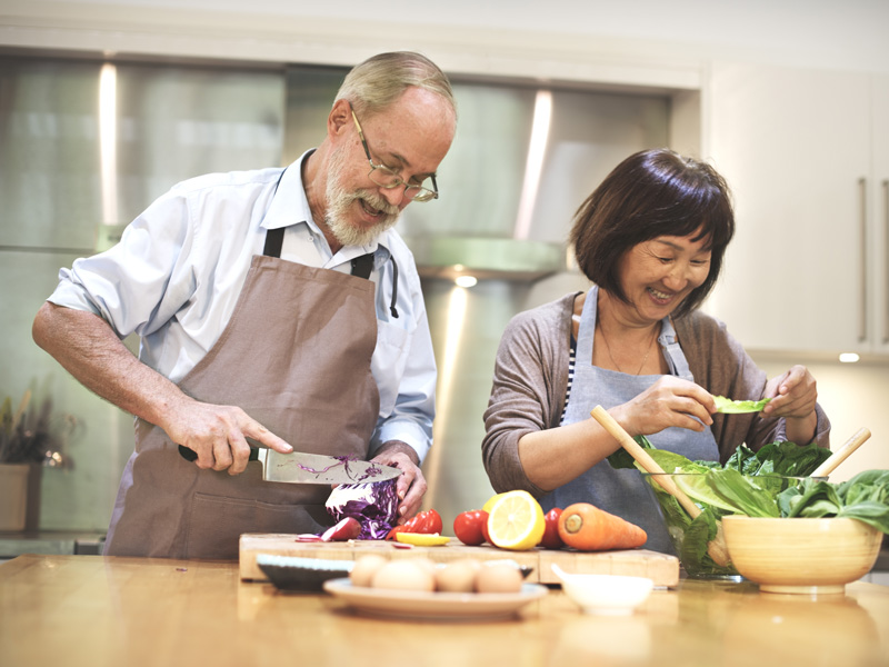 Man and woman preparing nutritional food